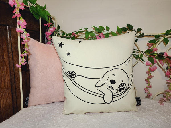 Coussin phosphorescent Chien au hamac.