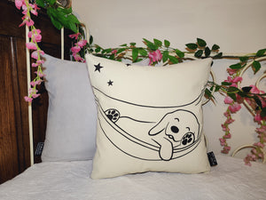 Coussin phosphorescent Chien au hamac.